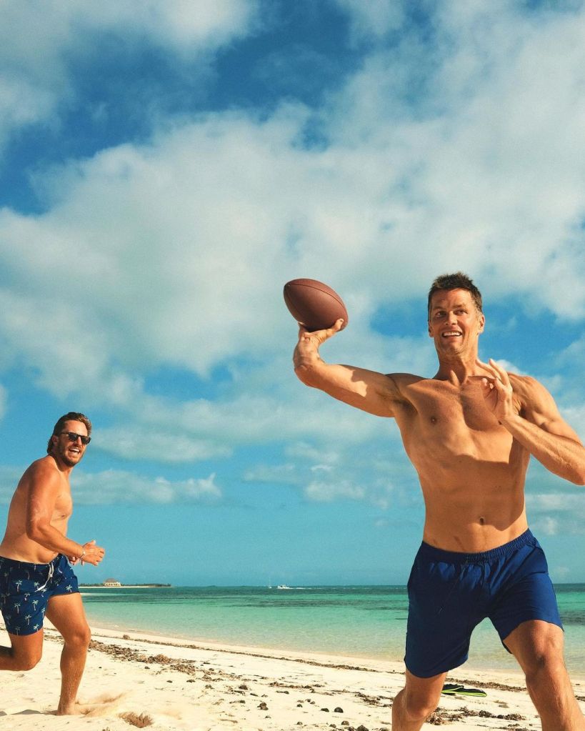 Tom Brady, 45, shirtless at the beach.